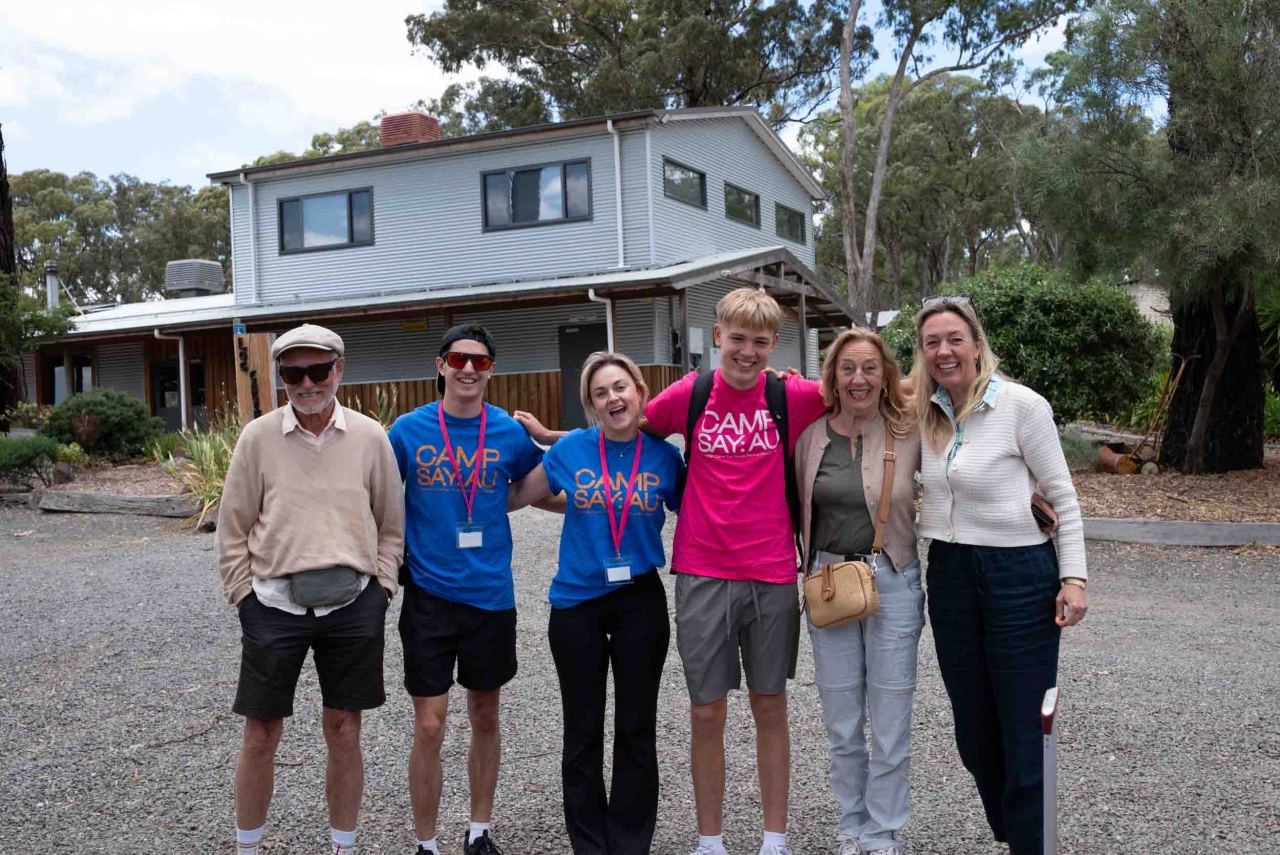 Group photo of people at camp say