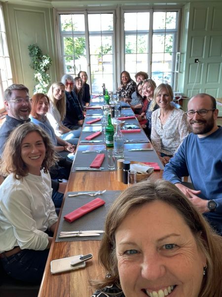 A photo of Bernadette gathering with her Global Audiology team in HQ Phonak.