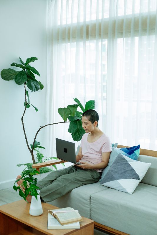 Woman on computer in living room