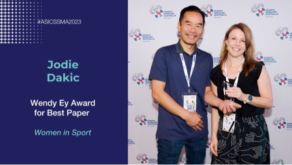 Jodie winning the award for best paper