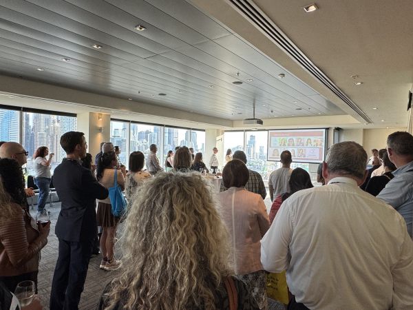 Guests listening to Head of Department sharing the year in review