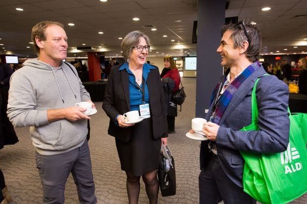 Attendees socialising at 2019 collab event