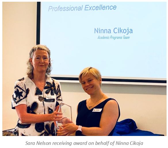 Photograph of Sara Nelson receiving award on behalf of Ninna Cikoja