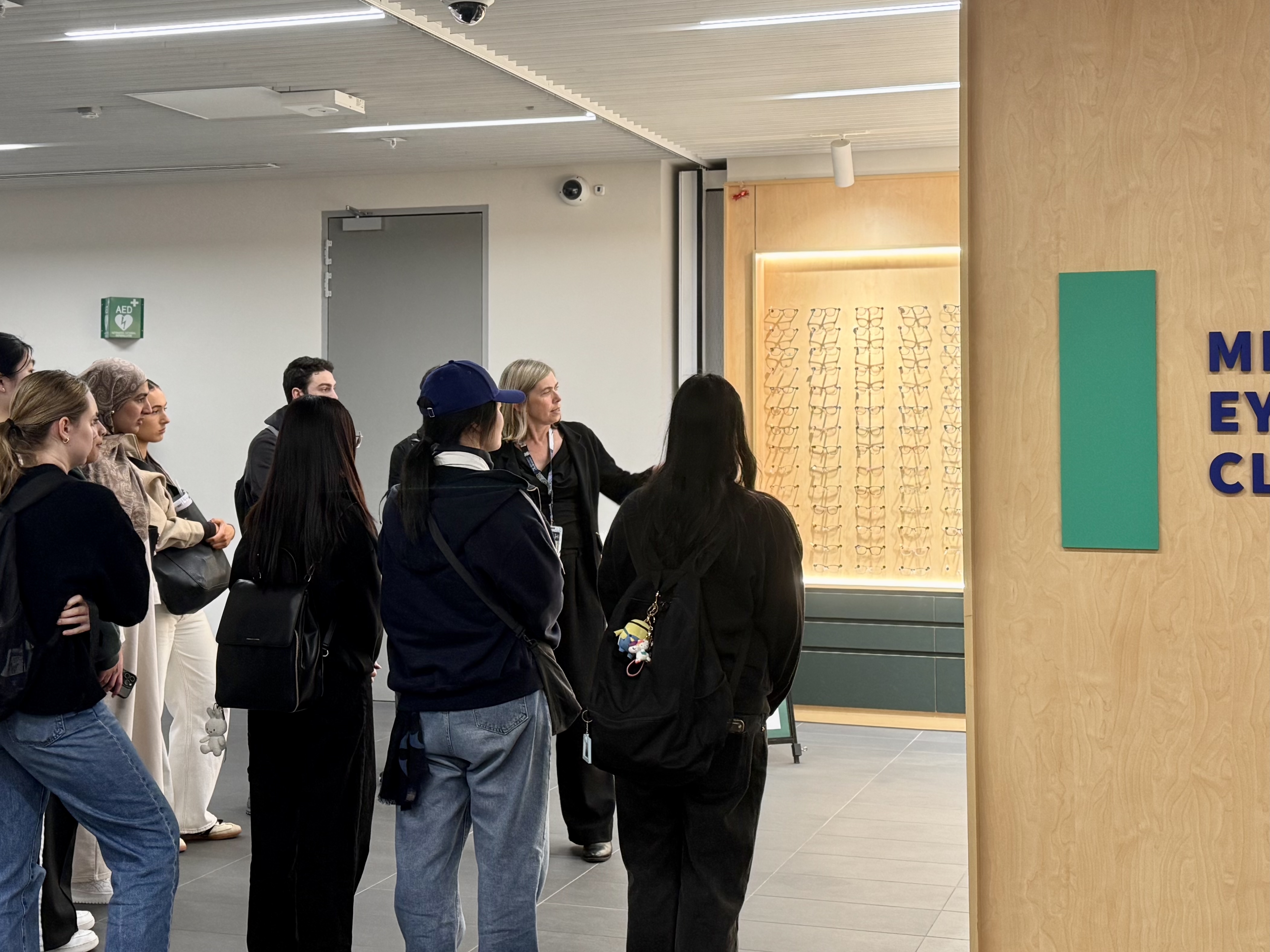 A/Prof Anthea leading students on a tour around Melbourne Eyecare Clinic