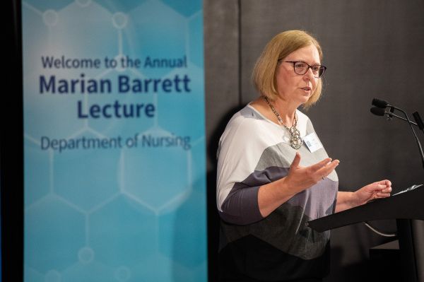 Photograph of Prof Leanne Aitken presenting lecture