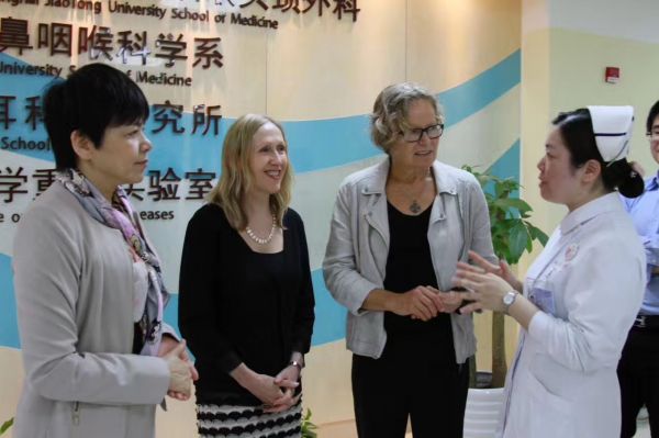 Professor Denise Harrison speaking with a nurse during her visit to Shanghai