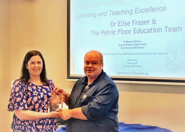 Dr Elise Fraser receiving award