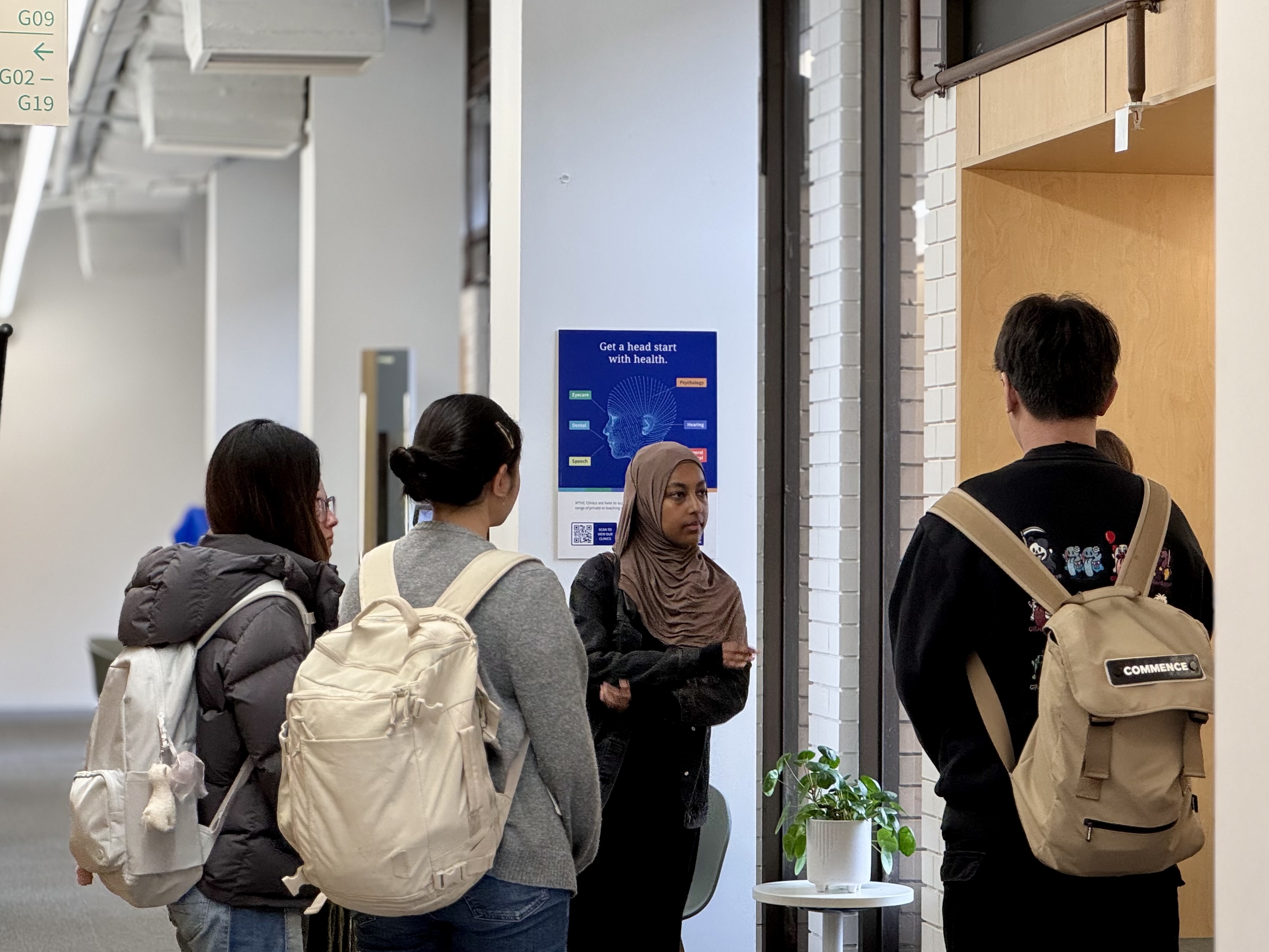 Students asking questions during tour