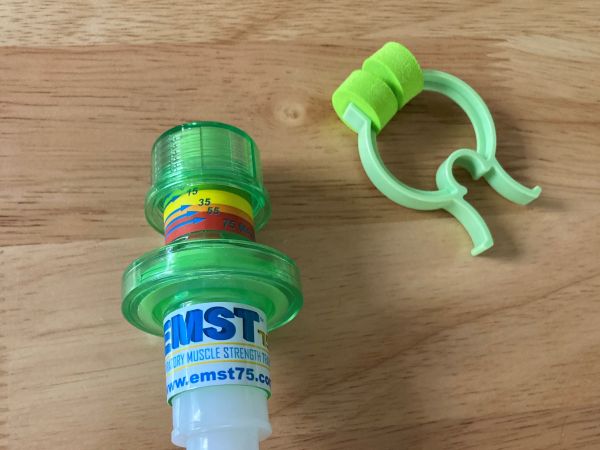 A picture of a expiratory muscle strength trainer device used to strengthen muscles for breathing, coughing and swallowing. 